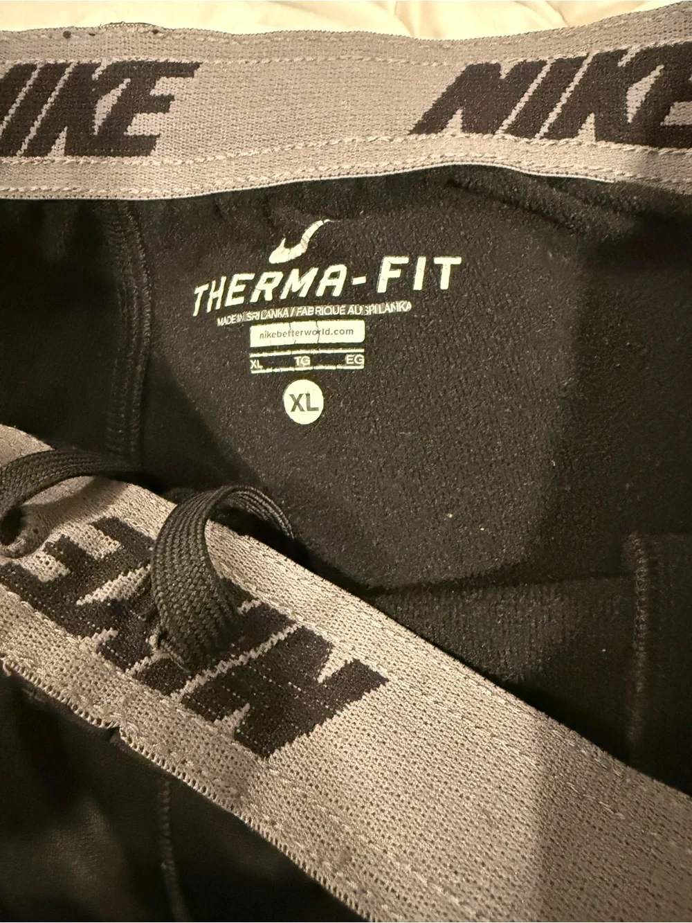 NIKE  Men's Black Track Pants with Red Side Panels